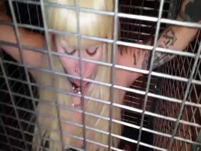 20067 - Blonde Deanna Caged and Cuffed- Short Throwback Video